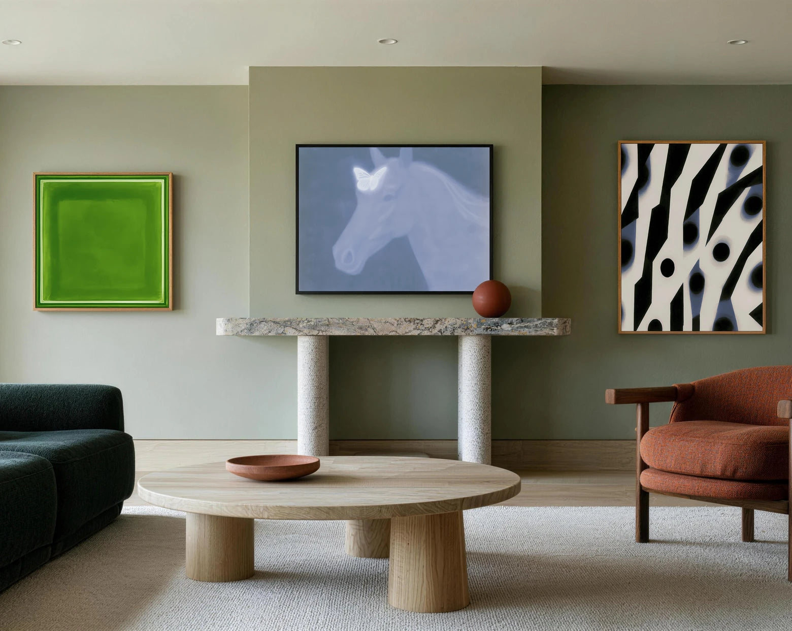 Sage au Lait — three framed artworks in a living room
